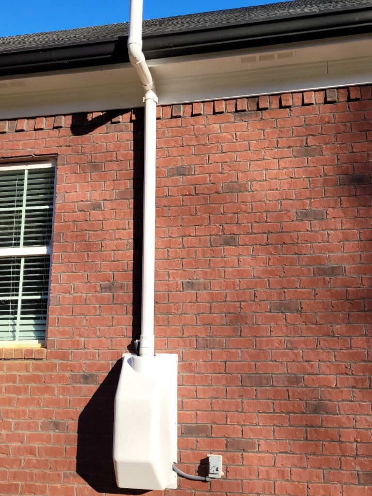 Exterior portion of a radon mitigation system. 